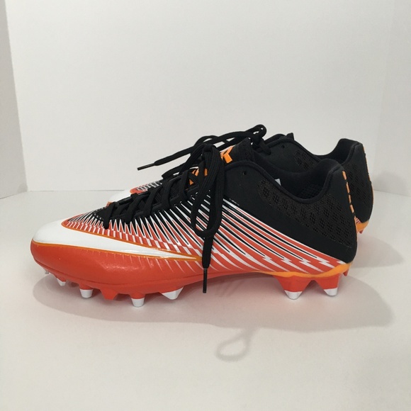orange and black cleats